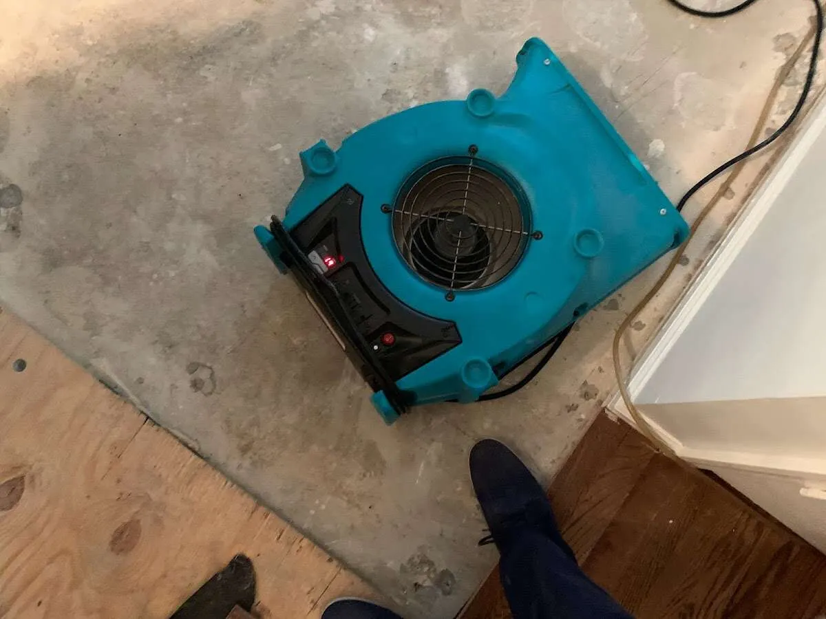 Air mover drying subfloor during Leak Detection & Repair in Pocatello
